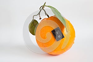 Single orange with switch in power off position on light grey ba