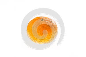 Single orange on white background