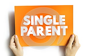 Single Parent - someone who is unmarried, widowed, or divorced and not remarried, text concept on card