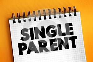 Single Parent - someone who is unmarried, widowed, or divorced and not remarried, text on notepad