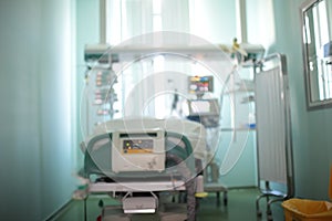 Single patient room with observation window in the intensive care unit, unfocused background photo