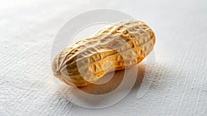 A single peanut in its shell, close-up studio shot on a textured surface. Generative AI
