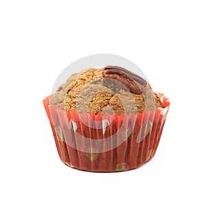 Single pecan nut muffin isolated