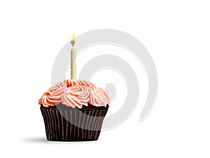 Single perfect cupcake with candle flame on white