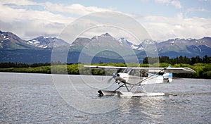 Single Prop Airplane Pontoon PLane Water Landing Alaska Last