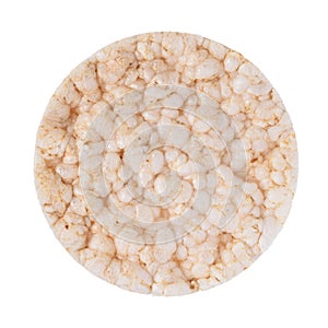 Single puffed rice cake isolated on white
