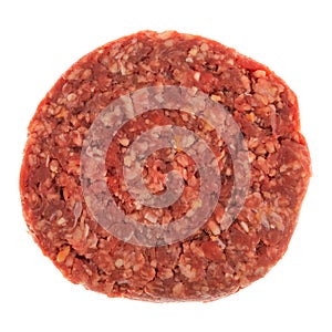 Single raw hamburger patty top view isolated on a white background