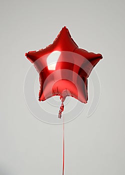 Single red big star metallic balloon object for birthday