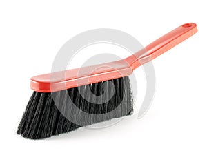 single red dusting brush isolated on white background