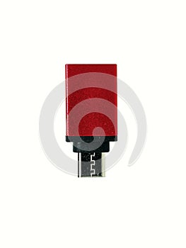 Single red otg adapter to connect usb devices to usb type c slots isolated on white background. OTG type c in closeup