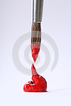 Single red stroke with paintbrush