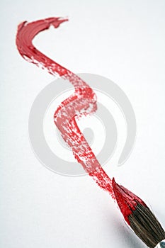Single red stroke with paintbrush