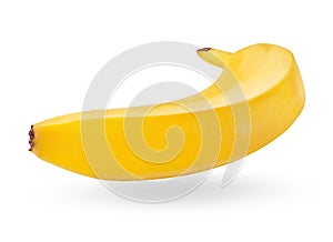 Single ripe banana isolated on white background. Yellow tropical flying fruit with shadow