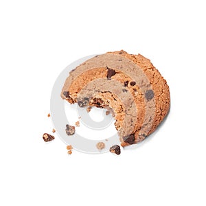 Single round chocolate chip biscuit with crumbs and bite missing, isolated on white from above.