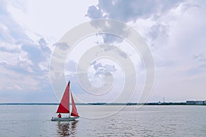 Single sail boat on the lake.