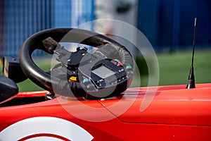 Single seater formula racing car steering wheel detail