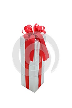 Single silver gift box with red ribbon isolated on white background