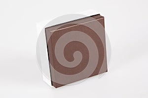 Single simple small Gift Box with brown cower in grey background