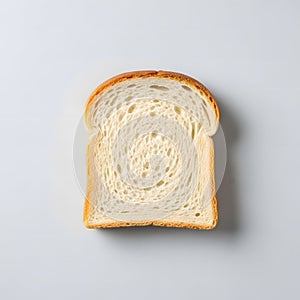 Single Slice of White Bread on a Light Background