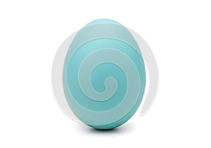 A single, smooth, teal-colored egg isolated on a white background