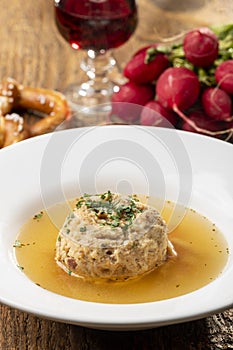 Single speckknoedel in soup