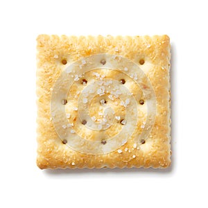 A single square saltine cracker isolated on a bright white background