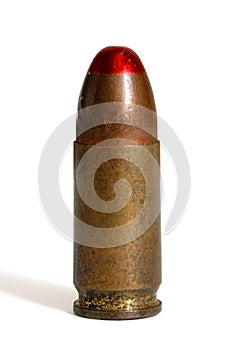Single standing tracer 9mm cartridge isolated photo