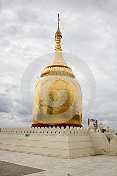 Single stupa painted in gold color
