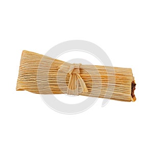 A single tamale isolated on a white background