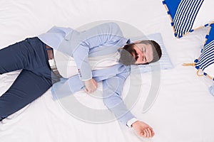 Single to mingle. Single man sleep in formalwear. Bearded man lying in bed alone. Wedding guest. Bachelor or bridegroom