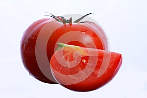 Single tomato isolated on white background
