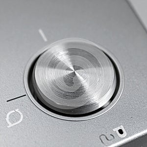 Brushed Metal Control Knob on a Modern Device