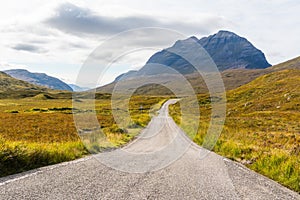 Single-track A832 road running through Beinn Eighe area in Scotland