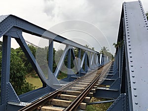 A single track railway bridge on a cloudy day