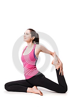 Single upside down woman doing aerial yogawith a hammock