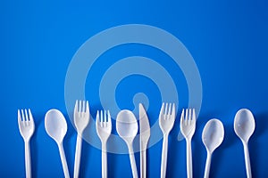 Single use plastic forks, spoons. concept of recycling plastic, plastic waste