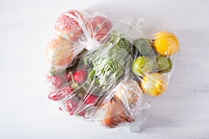 Single use plastic packaging issue. fruits and vegetables in plastic bags