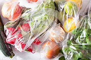 single use plastic waste issue. fruits and vegetables in plastic bags