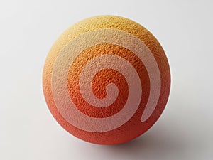 A single, vibrant orange with a smooth texture set against a plain, light background
