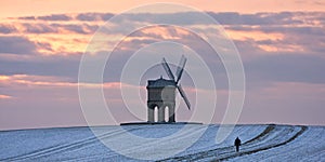 Single walker at Chesterton windmill in winter