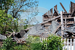 A single wall stands after strong storms destroyed this building