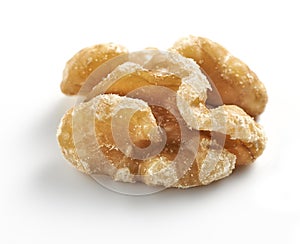 Single walnut on a white background with a soft shadow.