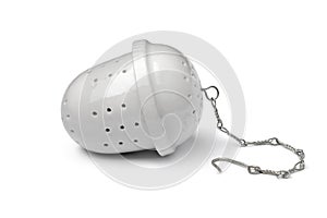 Single white ceramic tea strainer on white background