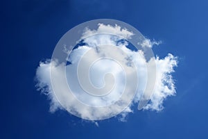 Single white cloud over blue sky