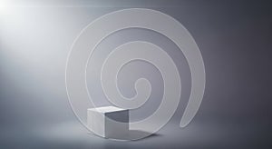 Single white cube illuminated by dramatic spotlight on gray background