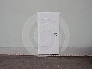 Single White Painted Modern Steel Door on Wall