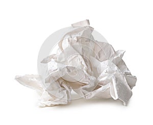 Single white screwed or crumpled tissue paper or napkin in strange shape after use in toilet or restroom isolated on white