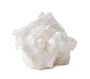 Single white screwed or crumpled tissue paper or napkin in strange shape after use in toilet or restroom isolated on white