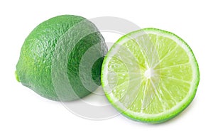 Single whole fresh green lemon with half isolated on white background with clipping path