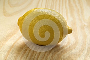 Single whole fresh lemon